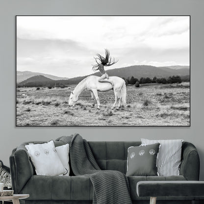 Black and white photo of a woman on a white horse in moody tones, ideal for Western Boho or modern rustic-style home decor.