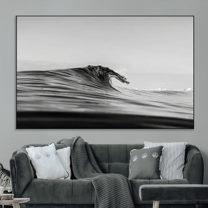 Striking black and white photo of a curling wave, ideal for modern coastal or minimalist wall decor settings.