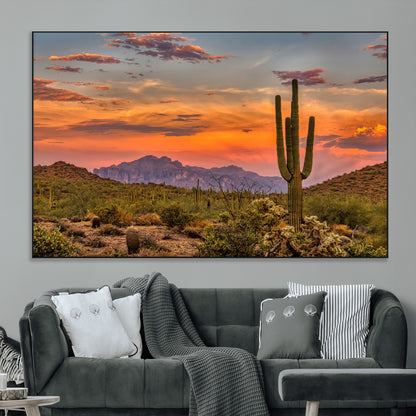Vibrant desert sunset with saguaro cacti and distant mountains, perfect for Southwestern or warm-toned home decor.