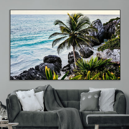 Framed canvas of a vibrant tropical coastline with palm trees, rocky cliffs, and turquoise waters, ideal for tropical coastal home decor.