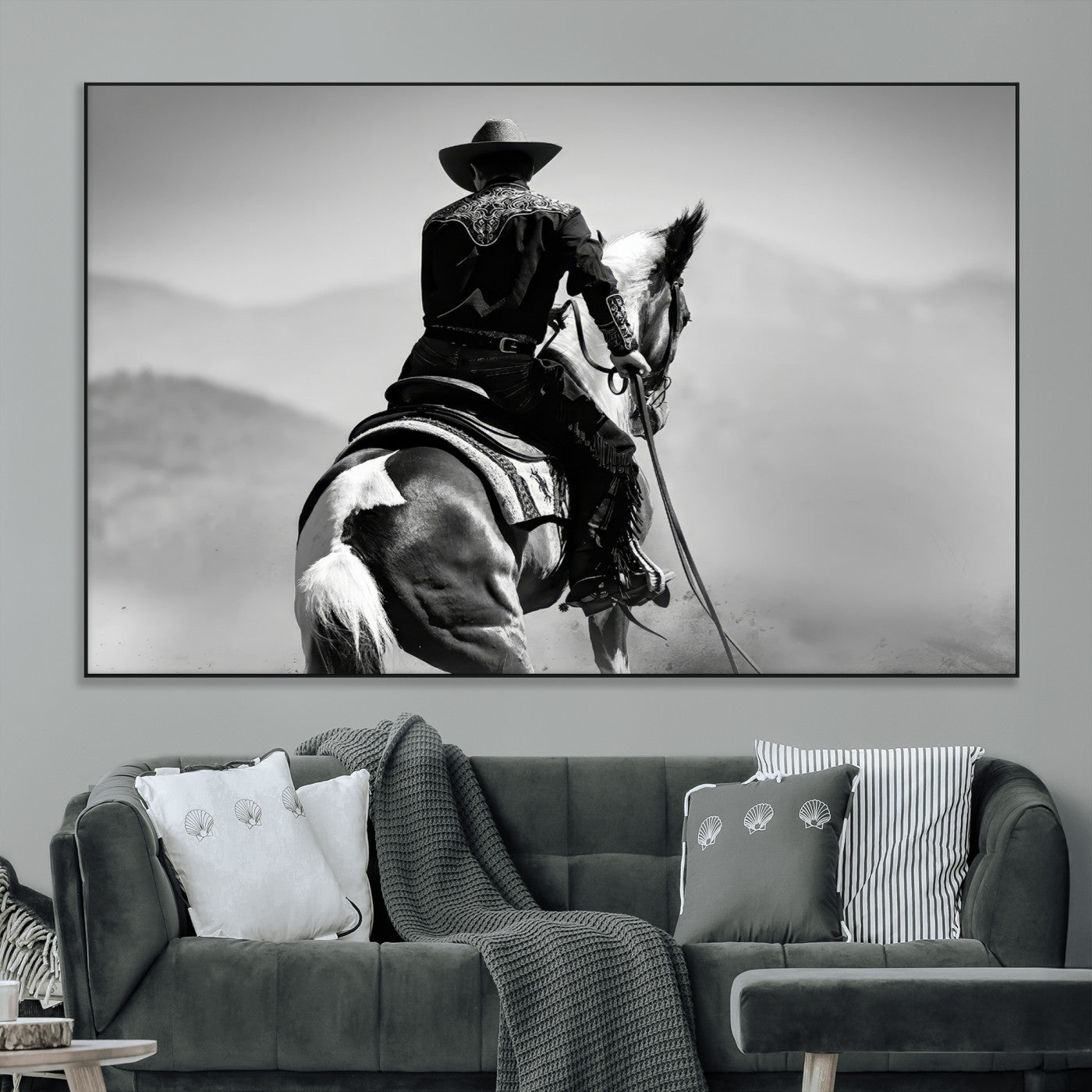 Black and white canvas of a cowboy on horseback with moody tones, perfect for rustic western or country-inspired home decor.