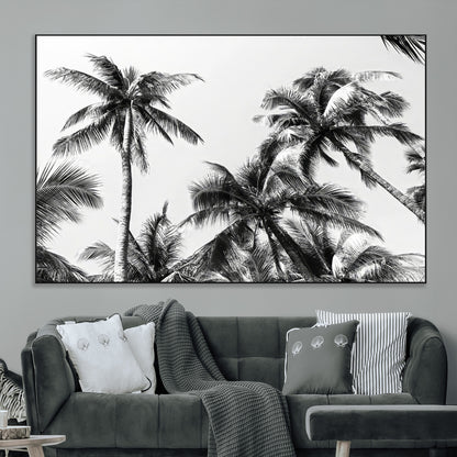 Black and white canvas of tall palm trees in moody tones, perfect for modern tropical minimalist or coastal-style home decor.