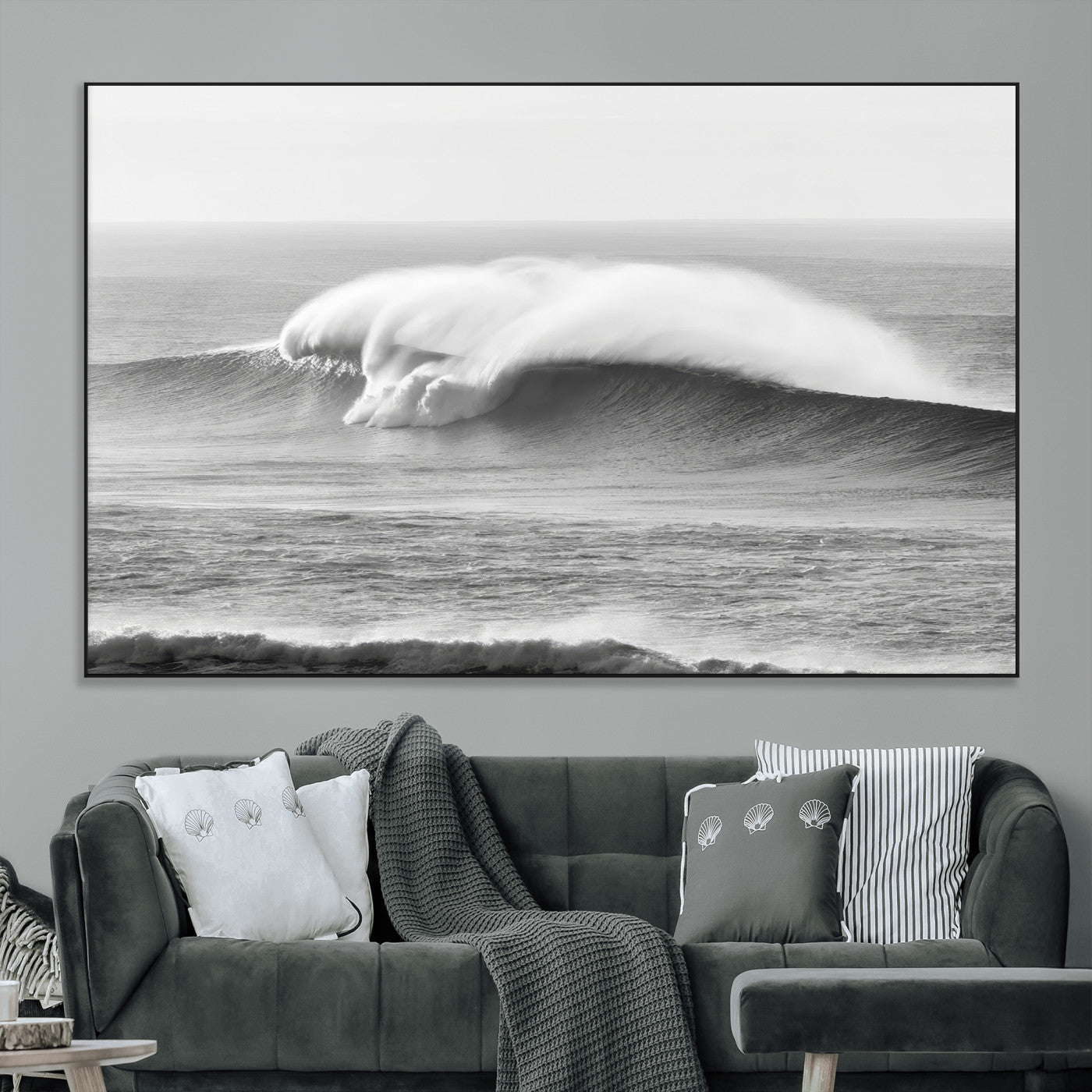 A dramatic black and white ocean wave crashing with immense force, capturing the raw power and movement of the sea in a bold seascape.