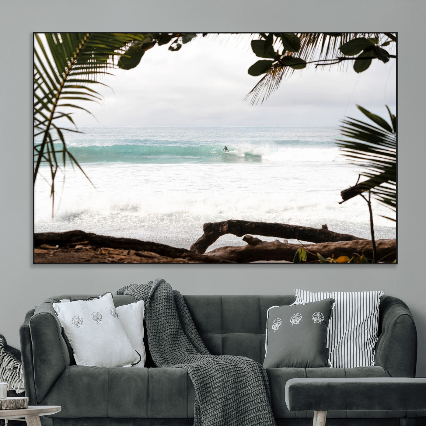 Tropical beach view with palm trees and surfer riding a wave, perfect for boho or coastal-inspired interior wall decor.