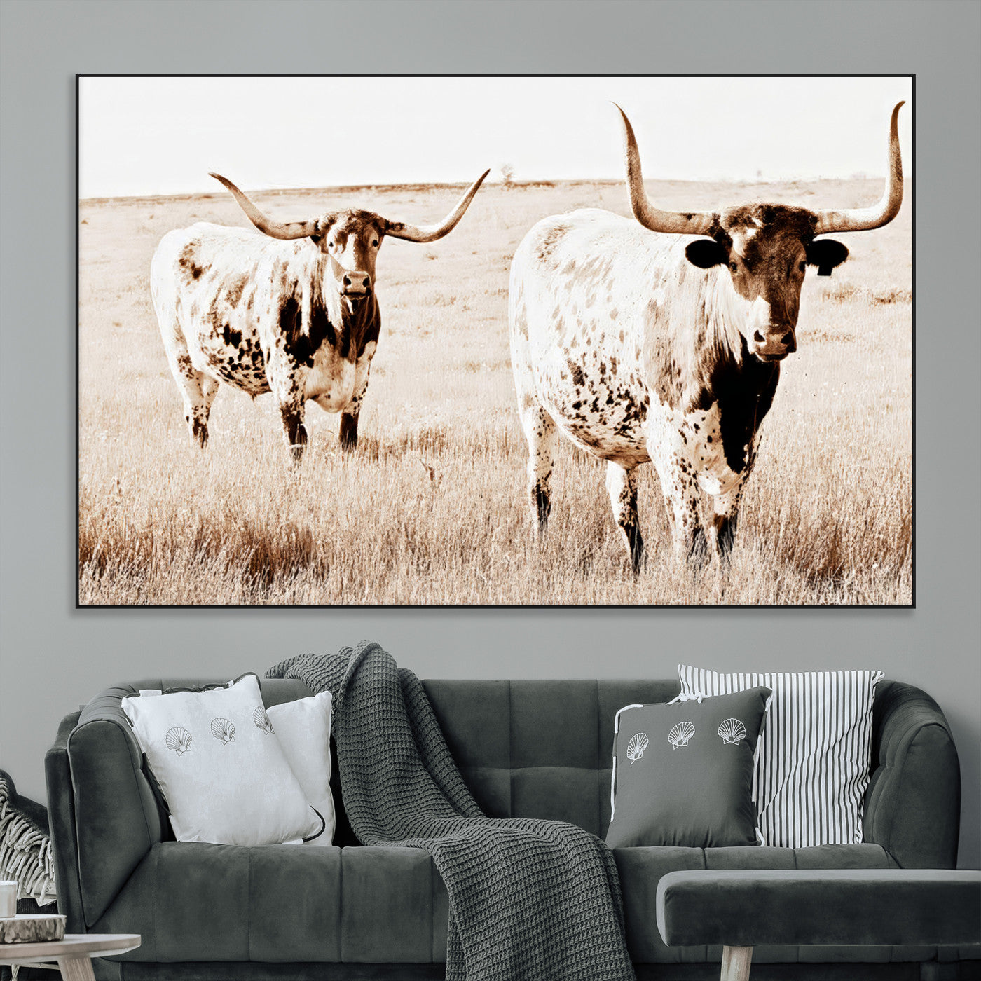 Two Texas longhorn cows standing in a sepia-toned pasture, evoking rustic charm perfect for farmhouse or western country interiors. (