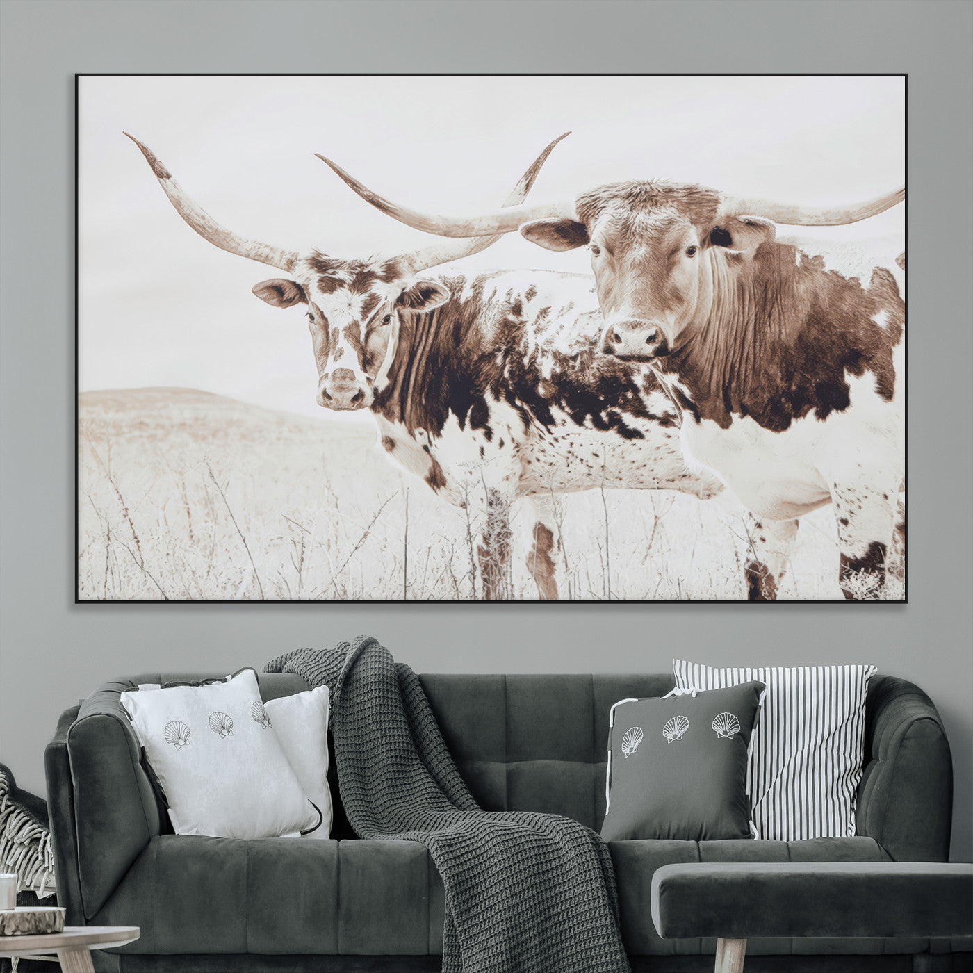 Two longhorn cows standing in a sepia-toned pasture with soft light, ideal for rustic or farmhouse-themed neutral wall decor.