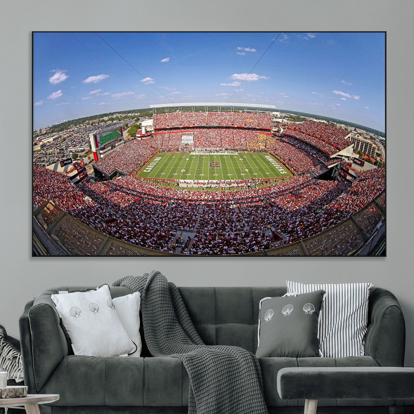 An William Brice-Stadium view of a full football stadium with cheering fans and clear blue skies, capturing the excitement and energy of the game.