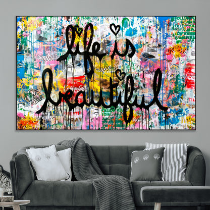 Colorful urban-style canvas with graffiti text “Life is Beautiful” in black paint, ideal for bold or street-themed home decor.