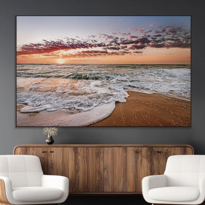 Canvas of a sunset over a foamy ocean shore with warm light and gentle waves, ideal for coastal or beach-themed home decor.
