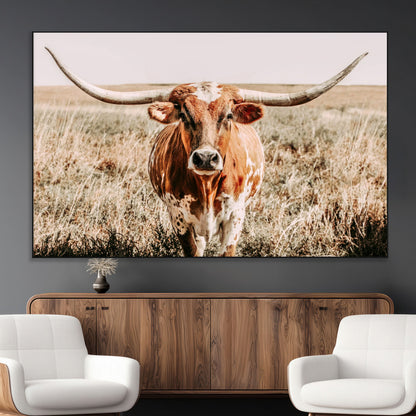 Framed longhorn cow canvas wall art with rustic prairie background, western animal print perfect for farmhouse or ranch style decor