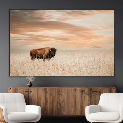 Bison Wall Art Print - Buffalo Canvas Print, featuring a lone bison in a golden prairie under a warm sunset sky, perfect for rustic and farmhouse decor.
