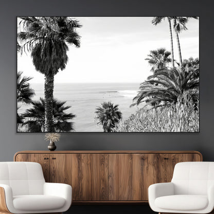 Monochrome canvas of palm trees framing a coastal surf scene, perfect for California-inspired or retro black-and-white beach decor.