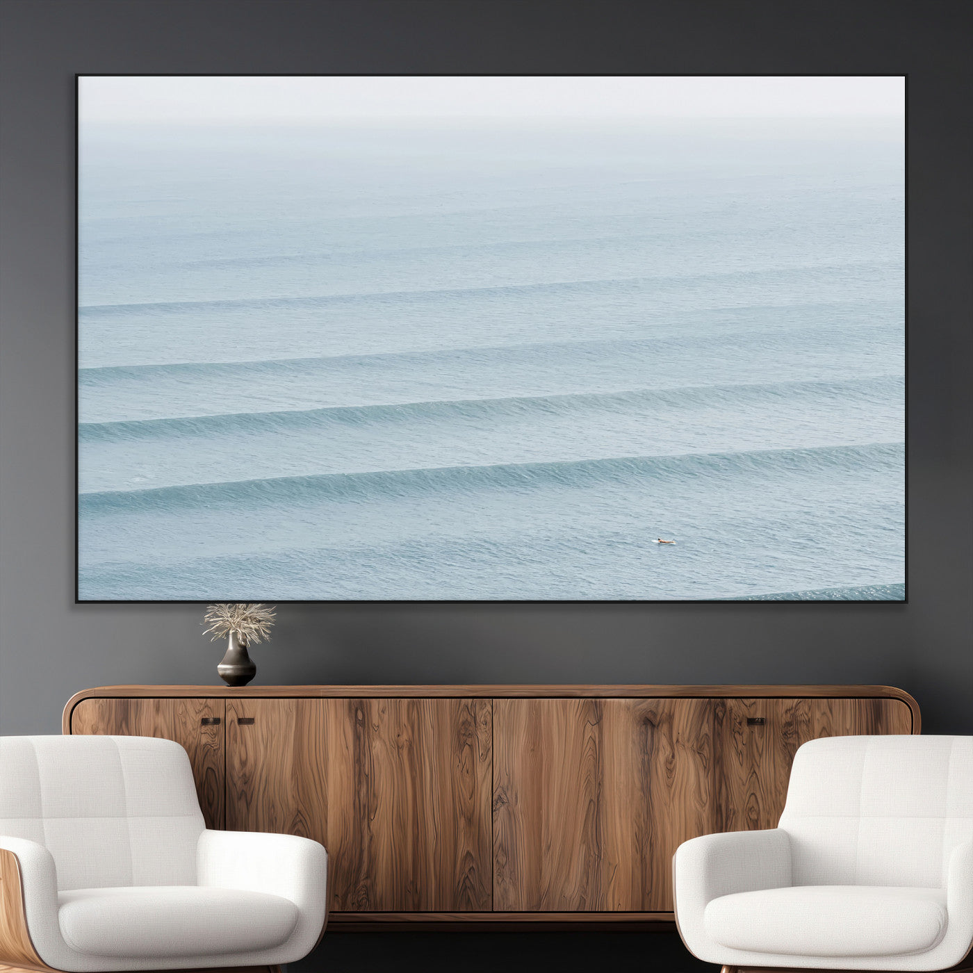 Framed canvas of repeating ocean waves with a distant solo surfer, ideal for minimalist ocean or calm coastal wall decor.