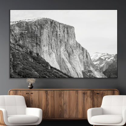 Monochrome canvas of El Capitan’s granite wall in Yosemite with snowy peaks, ideal for dramatic mountain or black-and-white nature decor.