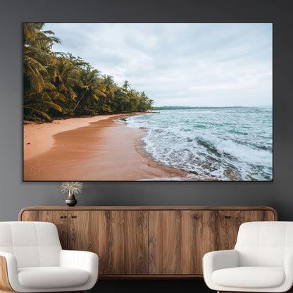Framed canvas of a tropical beach with palm trees and soft waves, ideal for coastal escape or serene nature-inspired home decor.