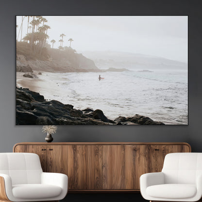Framed canvas of a surfer in misty coastal tones at a foggy California beach, ideal for minimalist coastal beach or serene ocean-themed decor.