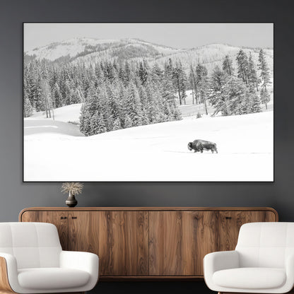 Snowy bison walking through white forest landscape, ideal for monochrome winter or wilderness-style interior wall decoration.