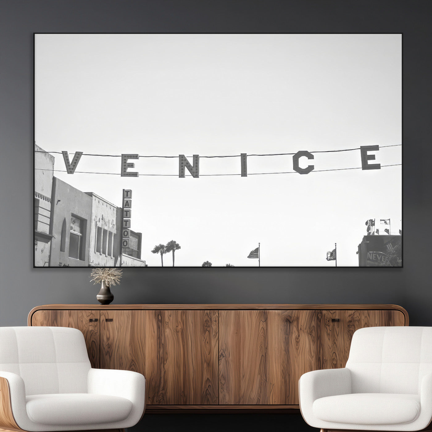 Black and white photo of Venice Beach sign and palm-lined street, perfect for urban coastal or minimalist LA-inspired wall decoration.