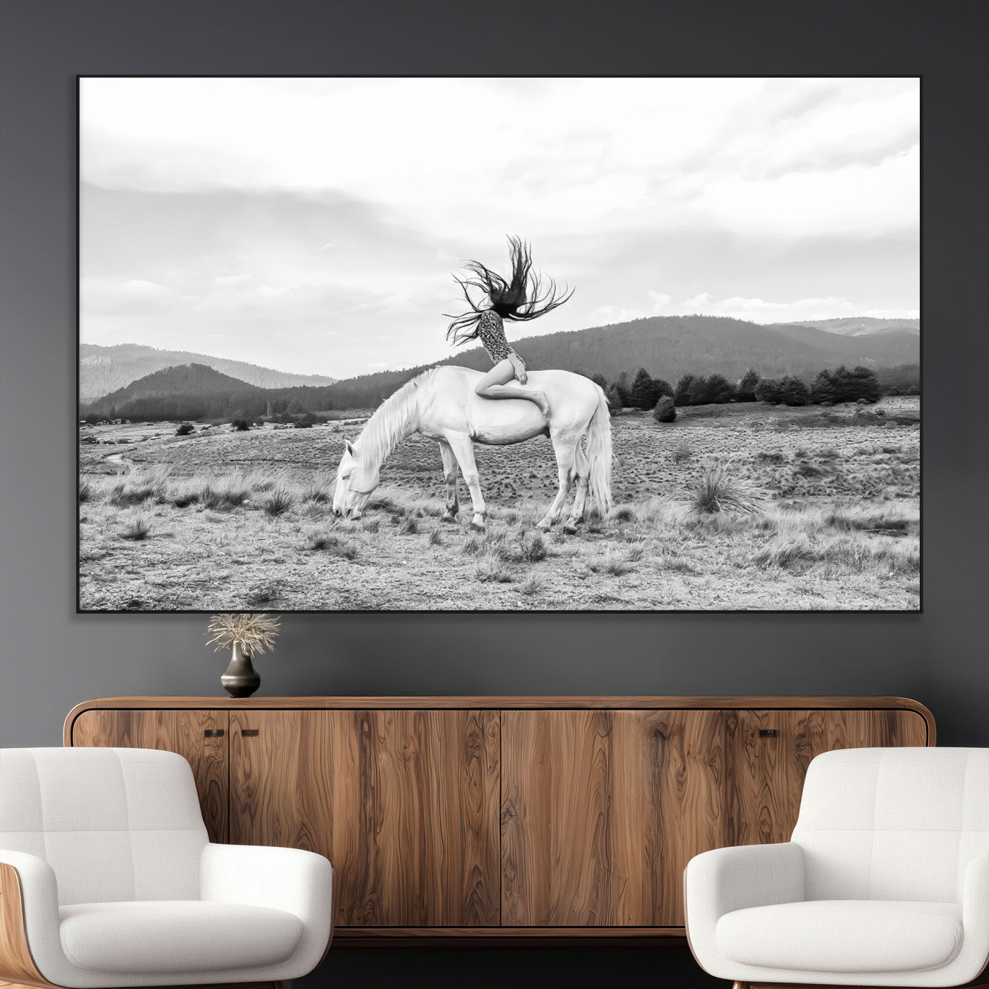 Black and white photo of a woman on a white horse in moody tones, ideal for Western Boho or modern rustic-style home decor.