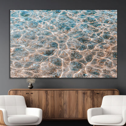 Close-up of sunlit ocean ripples with aqua blue and golden tones, ideal for modern coastal or minimalist home decor.