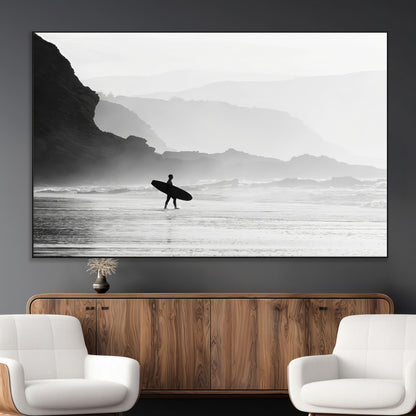 A lone surfer walking along a misty beach with cliffs in the background, carrying their board, capturing a serene and minimal ocean moment.