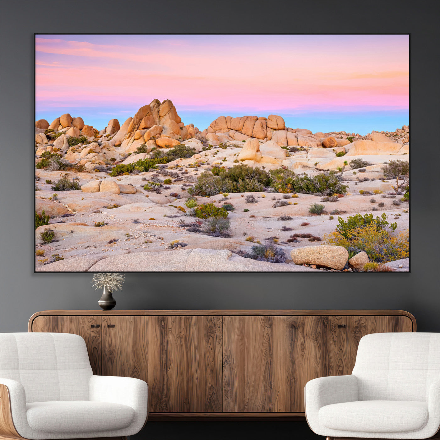 A breathtaking desert landscape featuring rugged rock formations under a vibrant pastel sunset sky, capturing the warmth and serenity of a Southwestern wilderness.
