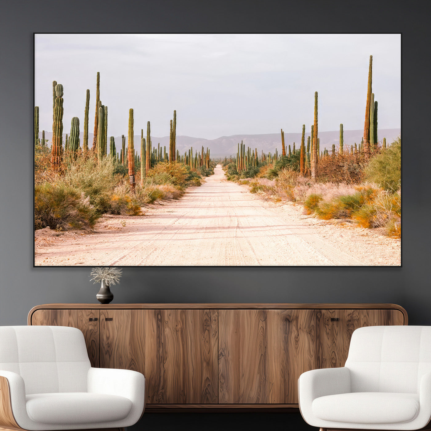 A desert road lined with saguaro cacti under a golden sky, creating a warm southwestern feel, perfect for boho or rustic decor.