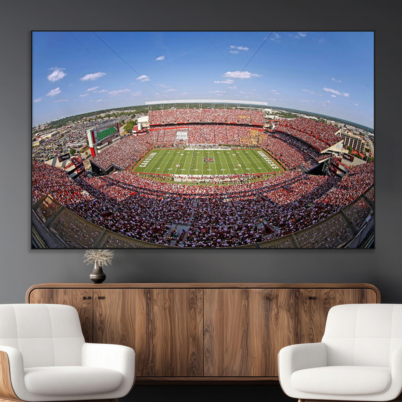 An William Brice-Stadium view of a full football stadium with cheering fans and clear blue skies, capturing the excitement and energy of the game.