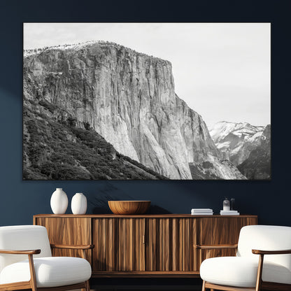 Monochrome canvas of El Capitan’s granite wall in Yosemite with snowy peaks, ideal for dramatic mountain or black-and-white nature decor.