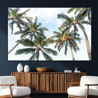 Framed canvas of tall palm trees reaching into a tropical sky, ideal for beach home or relaxed island-inspired wall decor.