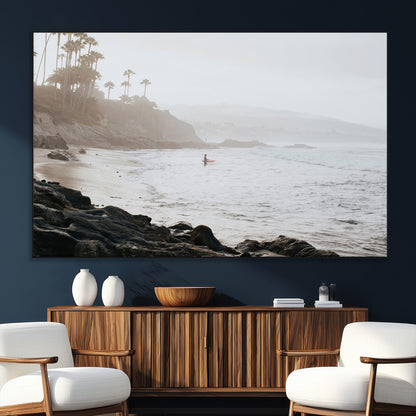 Framed canvas of a surfer in misty coastal tones at a foggy California beach, ideal for minimalist coastal beach or serene ocean-themed decor.