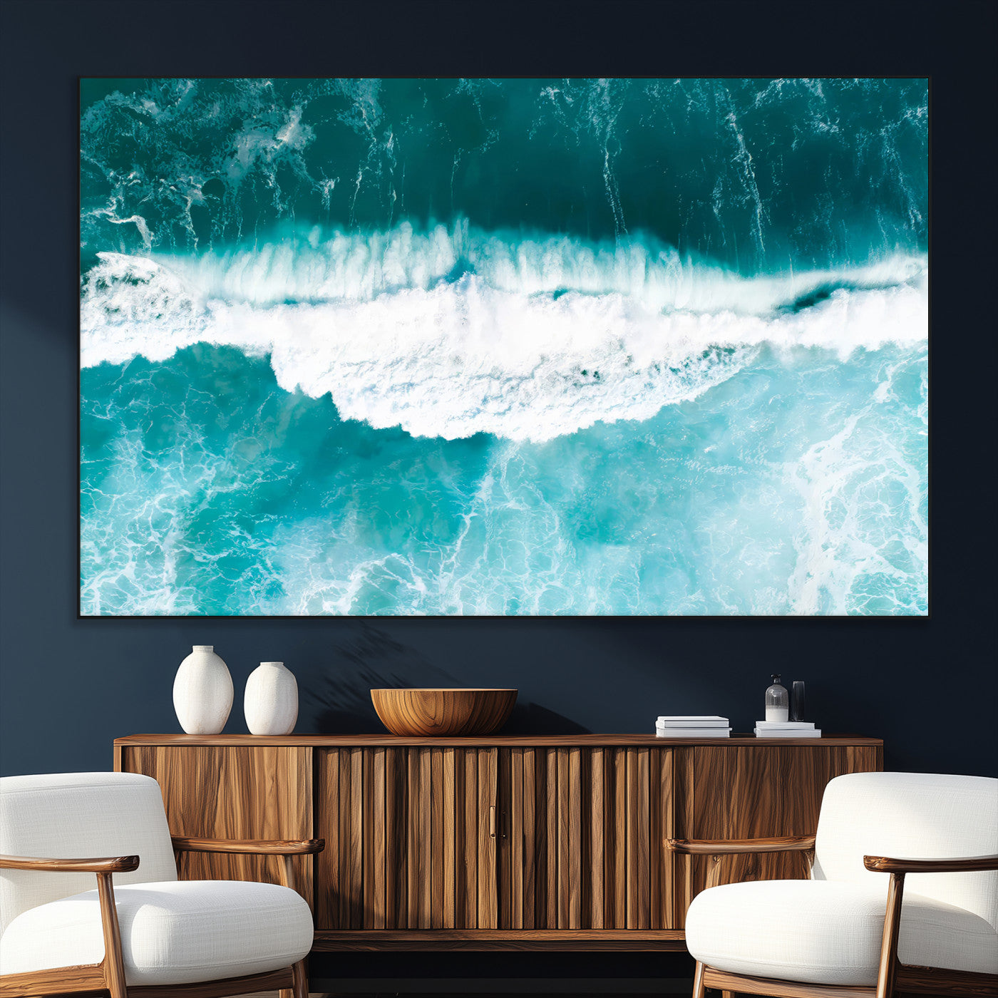 Aerial view of turquoise ocean waves crashing with white foam, perfect for tropical coastal or modern beach-style home decor.