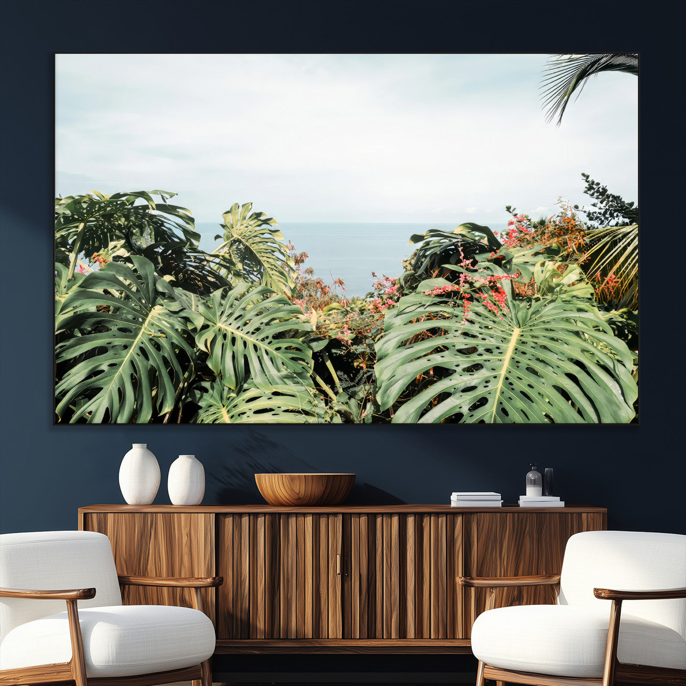 Monstera leaves and tropical flowers framing a calm ocean view, ideal for tropical coastal or exotic jungle-style interior wall decor.