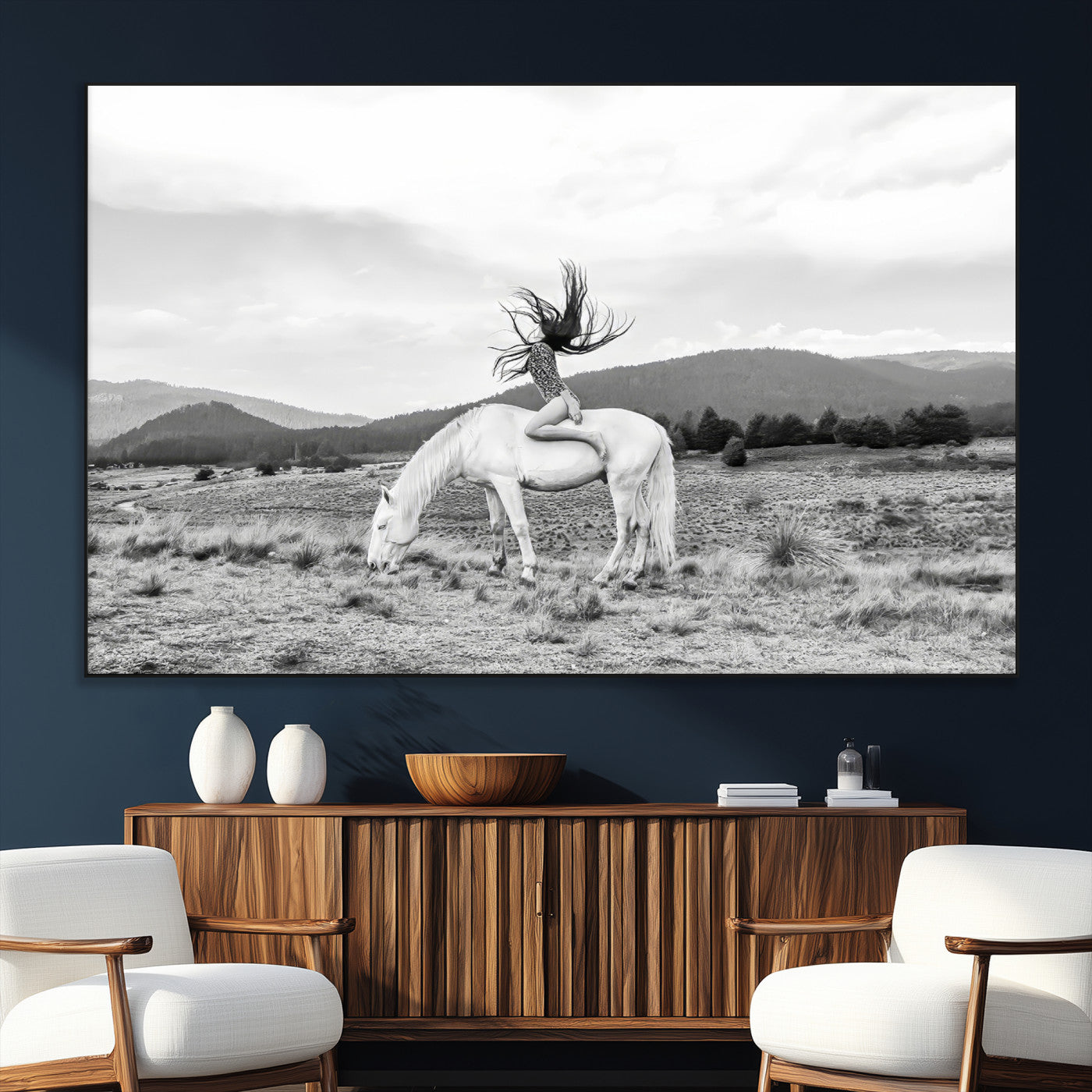 Black and white photo of a woman on a white horse in moody tones, ideal for Western Boho or modern rustic-style home decor.