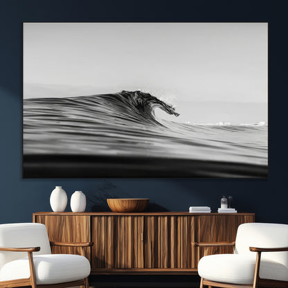 Striking black and white photo of a curling wave, ideal for modern coastal or minimalist wall decor settings.