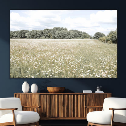 Soft-toned image of a wild daisy field under a cloudy sky, ideal for neutral or Scandinavian-inspired home decor.