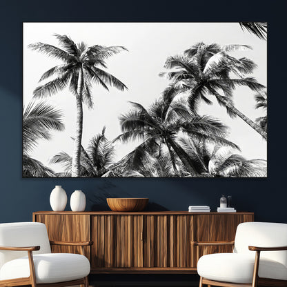 Black and white canvas of tall palm trees in moody tones, perfect for modern tropical minimalist or coastal-style home decor.