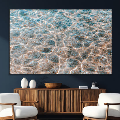 Close-up of sunlit ocean ripples with aqua blue and golden tones, ideal for modern coastal or minimalist home decor.