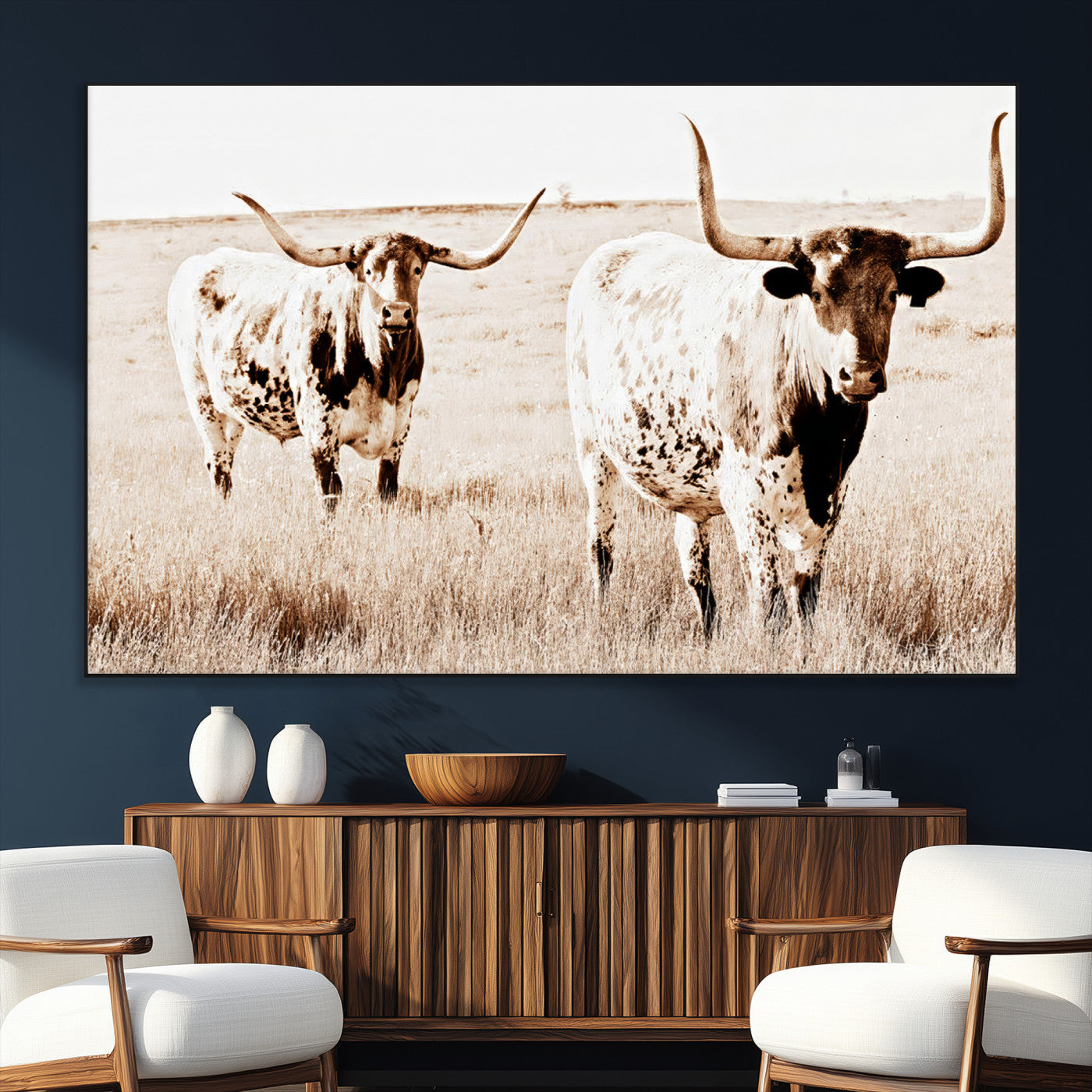 Two Texas longhorn cows standing in a sepia-toned pasture, evoking rustic charm perfect for farmhouse or western country interiors. (