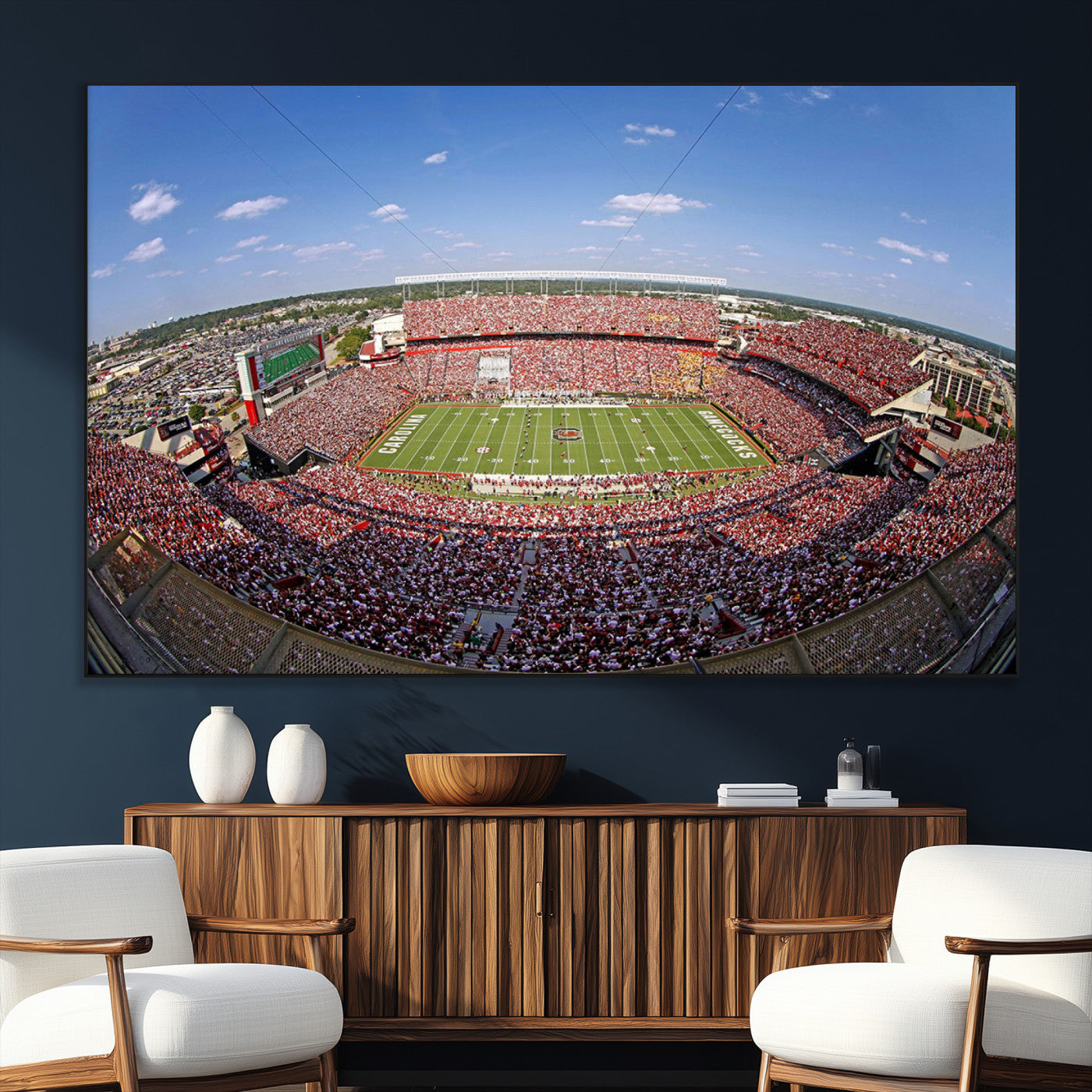 An William Brice-Stadium view of a full football stadium with cheering fans and clear blue skies, capturing the excitement and energy of the game.