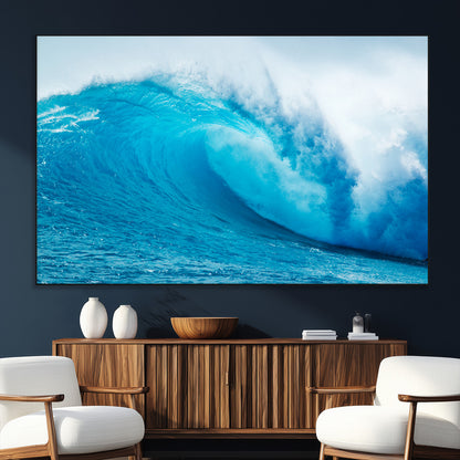 Vibrant canvas of a powerful curling ocean wave in tropical blue tones, perfect for coastal or surf-inspired decor settings.