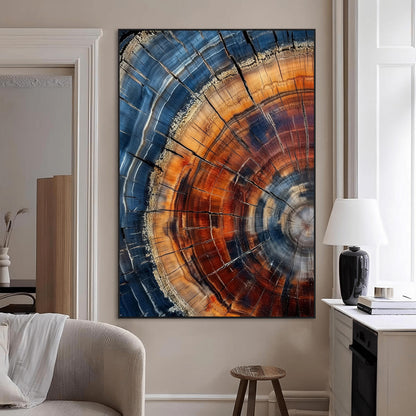 Canvas of colorful tree rings in rich blue and warm orange hues with cracked natural texture, ideal for rustic or earthy decor styles.