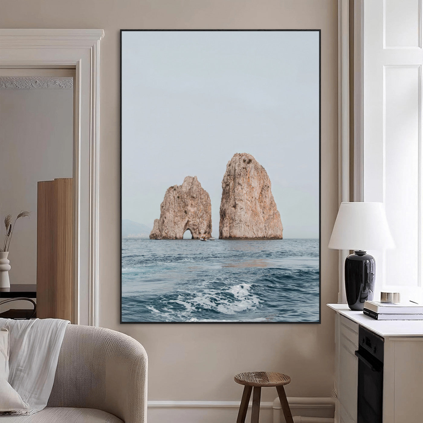 Serene photograph of the Faraglioni rocks in Capri with calm blue waters, perfect for Mediterranean coastal or minimalist travel-themed decor.