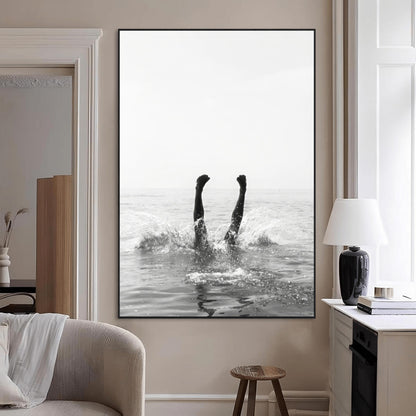 Black and white ocean art featuring a swimmer's legs mid-splash, perfect for minimalist, coastal, or monochrome modern interiors.