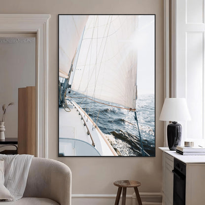 Canvas of a sailboat gliding on a sunlit ocean with white sails and sparkling water, ideal for coastal minimalist or nautical-style home decor.