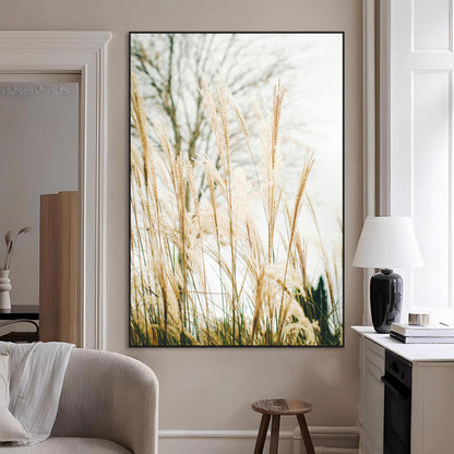 Soft beige pampas grass swaying in the breeze against a muted sky, creating a tranquil and minimalist botanical aesthetic.
