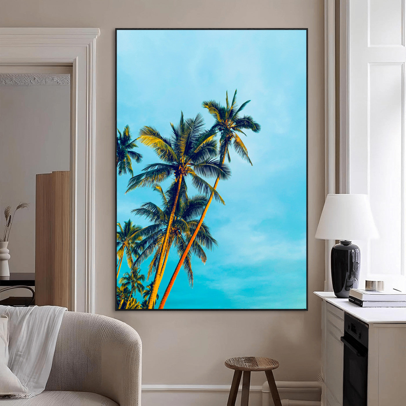 "Tall palm trees with golden sunlight against a vibrant blue sky, creating a tropical, relaxing atmosphere for coastal and beach-themed decor.