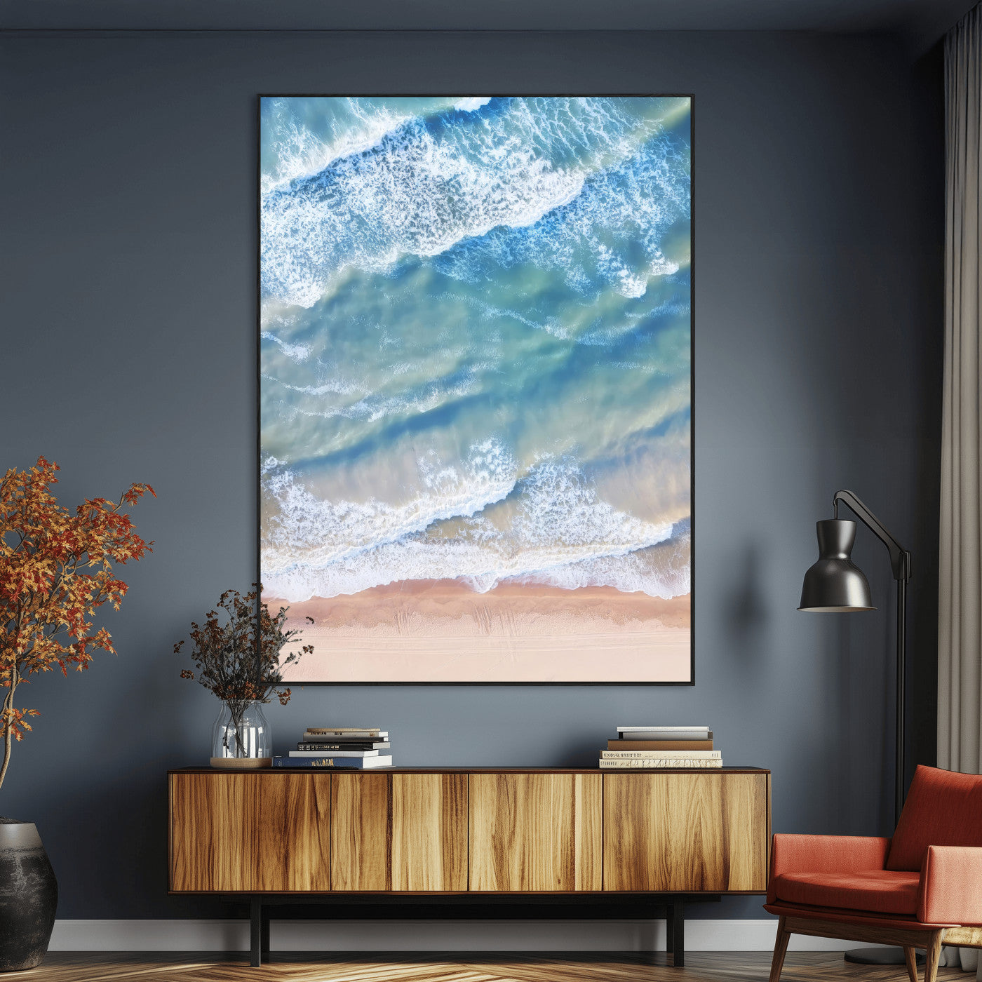 Aerial photo of soft blue waves meeting sandy shore, perfect for modern coastal or beach-themed decor with a light and tranquil aesthetic.