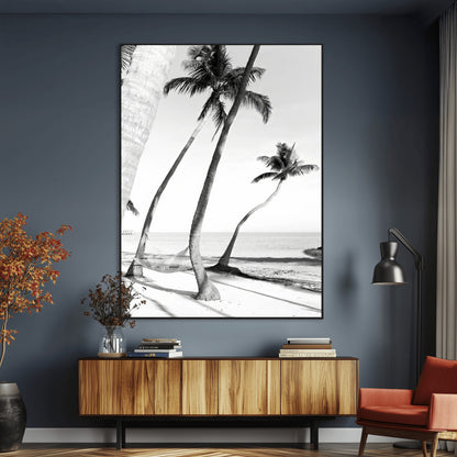 Black and white wall art of palm trees and a hammock on a beach, ideal for coastal minimalist or tropical-themed decor.