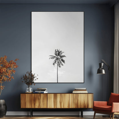 Canvas of a single palm tree in black and white with minimalist sky, ideal for modern coastal minimalist or tropical-inspired home decor.